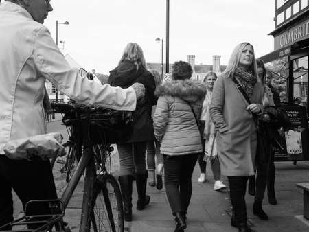 CAMBRIDGE, UK - CIRCA OCTOBER 2018: People in the city centre in black and whiteのeditorial素材