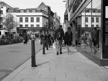 CAMBRIDGE, UK - CIRCA OCTOBER 2018: People in the city centre in black and whiteのeditorial素材