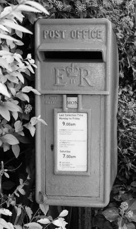 CAMBRIDGE, UK - CIRCA OCTOBER 2018: Royal Mail post box (aka collection box, mailbox, letter box or...