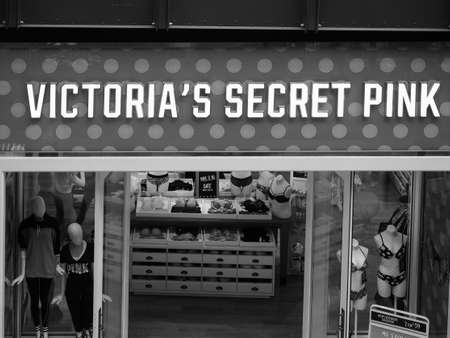 CAMBRIDGE, UK - CIRCA OCTOBER 2018: Victoria's Secret Pink shop at Grand Arcade shopping centre in black and whiteのeditorial素材