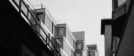 CAMBRIDGE, UK - CIRCA OCTOBER 2018: Wolfson Building at Trinity College in black and whiteのeditorial素材