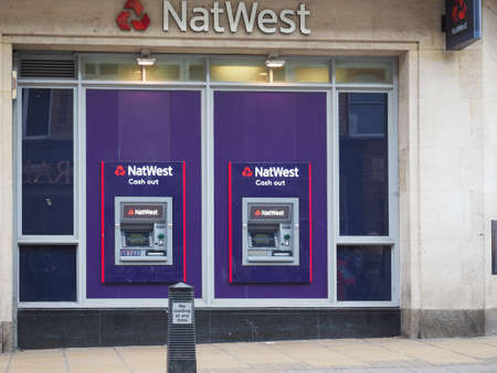 CAMBRIDGE, UK - CIRCA OCTOBER 2018: NatWest bank storefront with ATMのeditorial素材