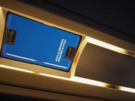 Uscita Emergenza (meaning Emergency Exit in Italian) on a bus roof