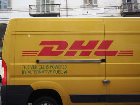 TURIN, ITALY - CIRCA NOVEMBER 2018: DHL courier vanのeditorial素材