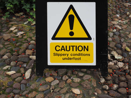 Caution slippery conditions warning danger signの写真素材