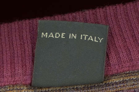 Made in Italy label on a woolen jumper jersey sweater garment