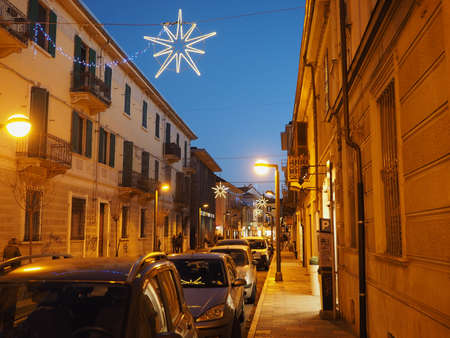 SETTIMO TORINESE, ITALY - CIRCA DECEMBER 2018: Via Roma central street with Christmas lights at nightのeditorial素材