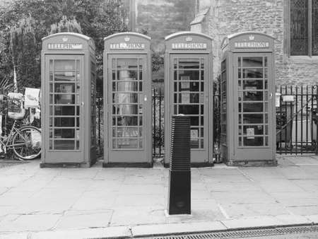 CAMBRIDGE, UK - CIRCA OCTOBER 2018: red telephone box in black and whiteのeditorial素材