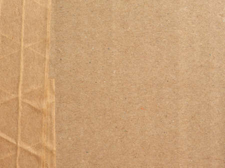 brown corrugated cardboard texture useful as a backgroundの写真素材