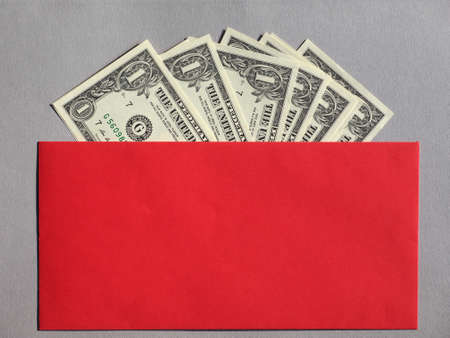 One Dollar banknotes money (USD), currency of United States in red envelopeの写真素材