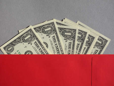 One Dollar banknotes money (USD), currency of United States in red envelopeの写真素材