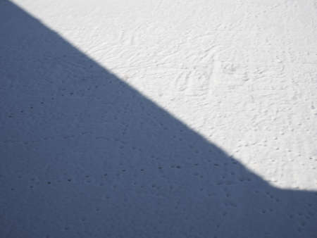 shadow over white snow useful as a backgroundの写真素材