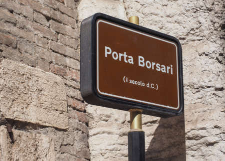 Porta Borsari (aka Porta Iovia) city gate sign in Verona, Italy
