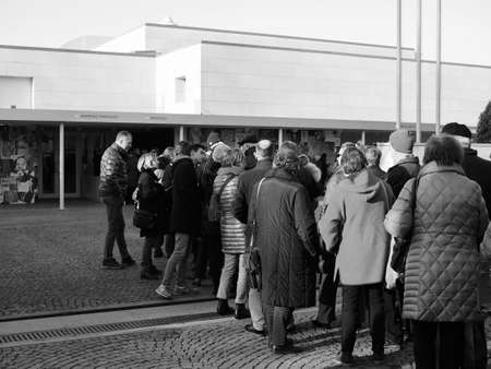 ALBA, ITALY - CIRCA FEBRUARY 2019: People queueing to visit an exhibition at Fondazione Ferrero art...