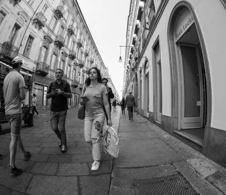 TURIN, ITALY - CIRCA SEPTEMBER 2018: People in the city centre in Via Garibaldi, view with fisheye lens in black and whiteのeditorial素材