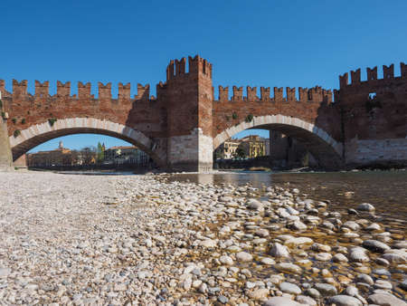 Ponte di Castelvecchio (meaning Old Castle Bridge) aka Ponte Scaligero (meaning Scaliger Bridge) over river Adige in Verona, Italyのeditorial素材