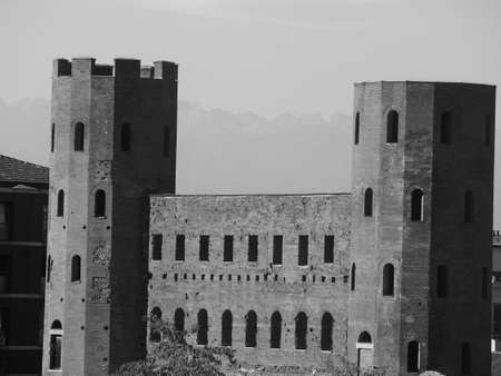Porta Palatina (Palatine Gate) ruins in Turin, Italy in black and white