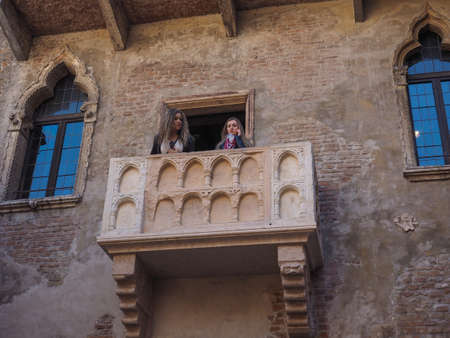 VERONA, ITALY - CIRCA MARCH 2019: House of Juliet Capulet (Giulietta Capuleti) with balcony made famous by William Shakespeare love tragedy Romeo and Julietのeditorial素材