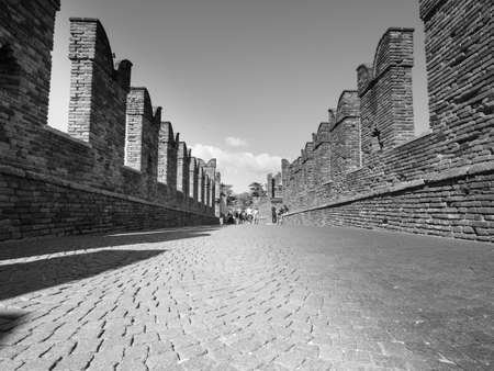 VERONA, ITALY - CIRCA MARCH 2019: Ponte di Castelvecchio (meaning Old Castle Bridge) aka Ponte Scaligero (meaning Scaliger Bridge) over river Adige in black and whiteのeditorial素材