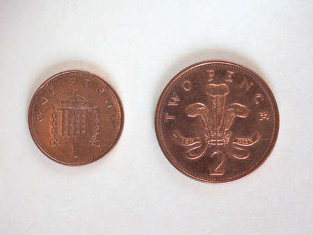 One Penny and Two Pence Pound coins money (GBP), currency of United Kingdom, soon to be withdrawn,...