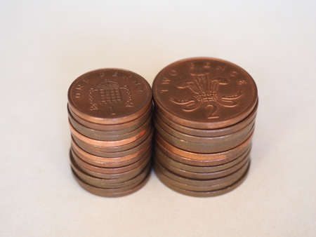 One Penny and Two Pence Pound coins money (GBP), currency of United Kingdom, soon to be withdrawn, possiblyの写真素材
