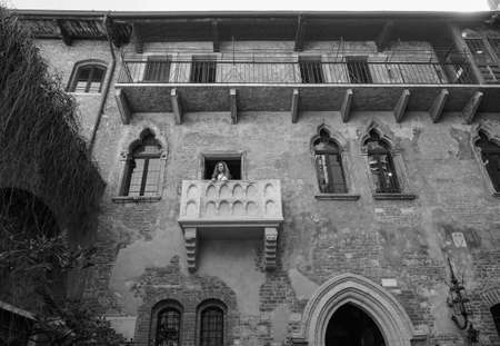 VERONA, ITALY - CIRCA MARCH 2019: House of Juliet Capulet (Giulietta Capuleti) with balcony made famous by William Shakespeare love tragedy Romeo and Juliet in black and whiteのeditorial素材