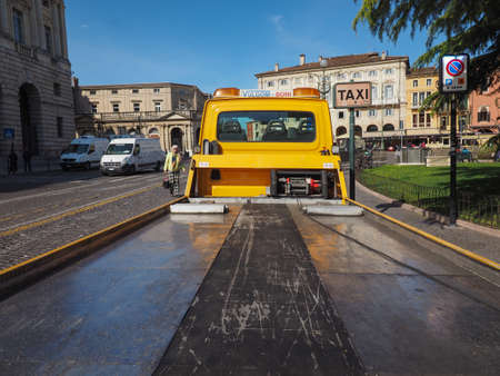 VERONA, ITALY - CIRCA MARCH 2019: tow truck to pull vehicleのeditorial素材