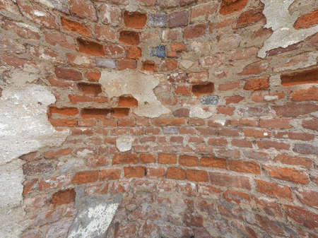 curved red brick wall texture useful as a background