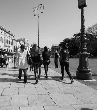 VERONA, ITALY - CIRCA MARCH 2019: People in the city centre in black and whiteのeditorial素材