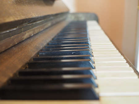 detail of piano keyboard keys on vintage instrument