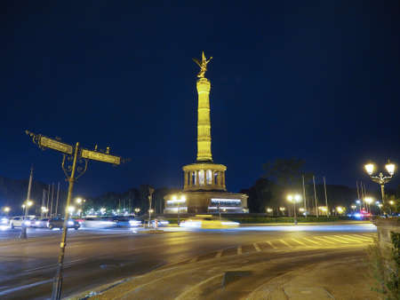 Angel statue aka Siegessaeule (meaning Victory Column) in Tiergarten park in Berlin, Germany at nightの写真素材