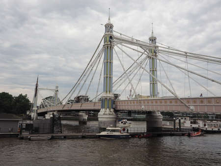 LONDON, UK - CIRCA JUNE 2019: Albert Bridge crossing River Thamesのeditorial素材
