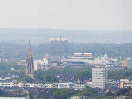 Bettenhaus Unilink and Herz Jesu Kirche church in Koeln, Germanyの写真素材