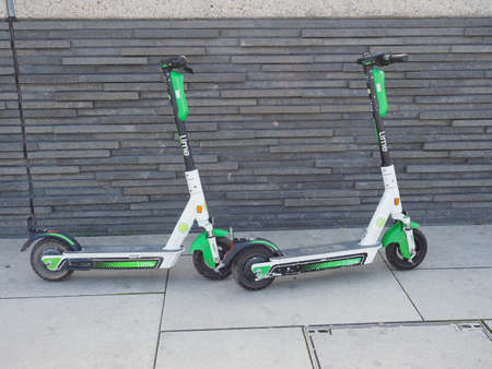 KOELN, GERMANY - CIRCA AUGUST 2019: Lime electric kick scooter personal urban mobility wheeled...