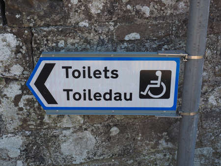 Disabled toilets (toiledau) sign in both English and Welsh languageの写真素材