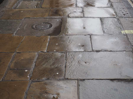 wet pavement useful as a background with copy spaceの写真素材