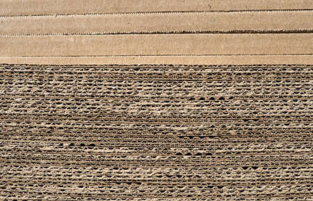 brown corrugated cardboard texture useful as a background