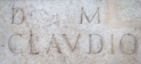 LONDON, UK - CIRCA SEPTEMBER 2019: Ancient marble inscription with name Clavdio (Claudio) at British Museumのeditorial素材