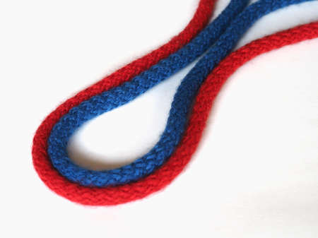 red and blue rope over off white background