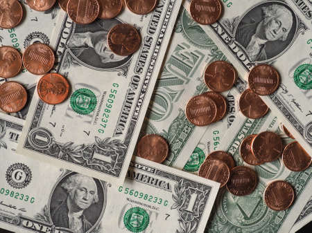 Dollar banknotes and coins (USD), currency of United Statesの写真素材
