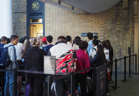 LONDON, UK - CIRCA SEPTEMBER 2019: Harry Potter Platform Nine and Three Quarters at King's Cross Stationのeditorial素材