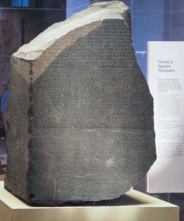 LONDON, UK - CIRCA SEPTEMBER 2019: Rosetta Stone stele at the British Museum with text in Ancient Egyptian hieroglyphic, Demotic scripts and Ancient Greekのeditorial素材
