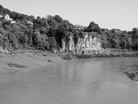 River Wye (Afon Gwy in Welsh) marks the border between England and Wales in Chepstow, UK in black and whiteの写真素材