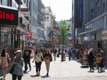 DUESSELDORF, GERMANY - CIRCA AUGUST 2019: People in the city centre