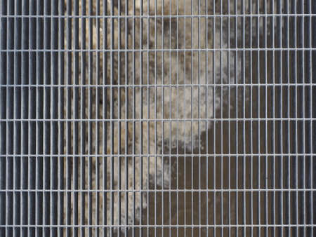 grey steel mesh texture useful as a background