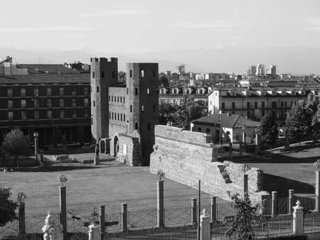 Porta Palatina (Palatine Gate) ruins in Turin, Italy in black and white