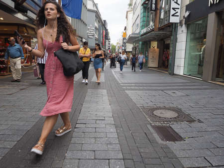 KOELN, GERMANY - CIRCA AUGUST 2019: People in Hohe Strasse (meaning High Street) shopping streetのeditorial素材