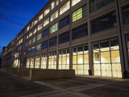 TURIN, ITALY - CIRCA NOVEMBER 2019: The Lingotto centre at night. Designed by Matte Trucco in 1919...