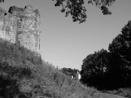 Ruins of Chepstow Castle (Castell Cas-gwent in Welsh) in Chepstow, UK in black and whiteのeditorial素材