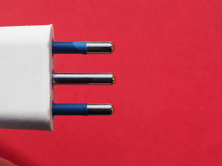 three pole round pin italian plug for electric powerの写真素材